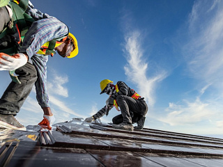 Кровельщик стальных кровель